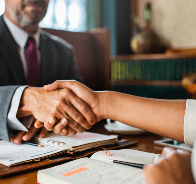 two people shaking hands